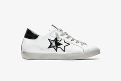 LOW SNEAKERS IN WHITE LEATHER - DETAILS IN BLACK PAINT WITH "USED" EFFECT
